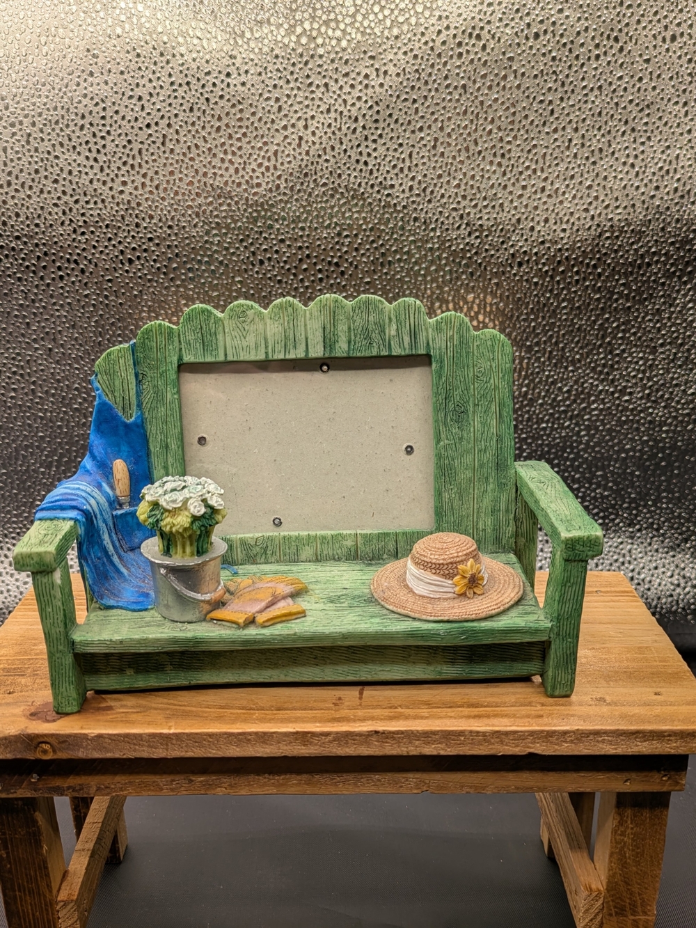 Green Wooden Bench Picture Frame with Hat and Potted Flowers